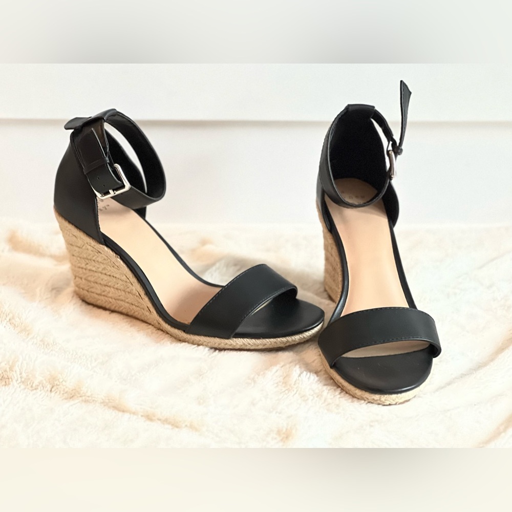 Like new black ankle strap wedge, 4” heel, worn once.